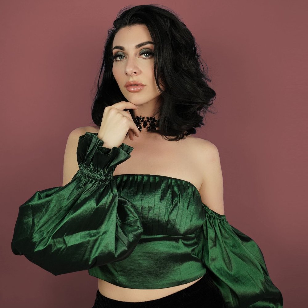 Lovers + Friends Fraya Top in green.